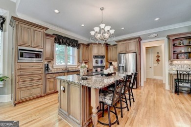 Discover the ultimate in upscale living in one of the area's on Royal Lakes Golf and Country Club in Georgia - for sale on GolfHomes.com, golf home, golf lot