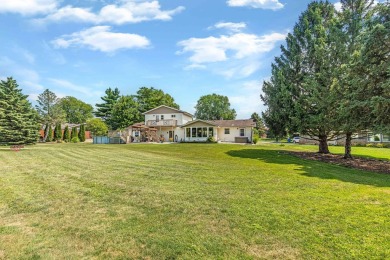 Gorgeous home in the heart of Stoughton's desirable Country Club on Stoughton Country Club in Wisconsin - for sale on GolfHomes.com, golf home, golf lot