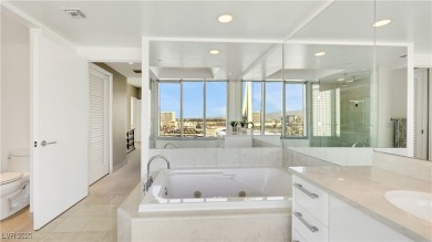Charming two-bedroom residence offering beautiful views of the on Las Vegas Country Club in Nevada - for sale on GolfHomes.com, golf home, golf lot