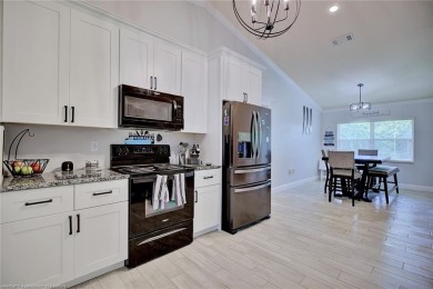 Welcome to this beautifully renovated 4 bedroom, 2 bathroom home on Sun n Lake Golf and Country Club in Florida - for sale on GolfHomes.com, golf home, golf lot