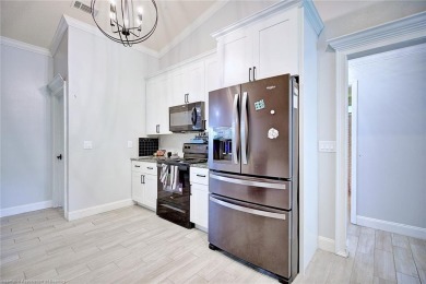 Welcome to this beautifully renovated 4 bedroom, 2 bathroom home on Sun n Lake Golf and Country Club in Florida - for sale on GolfHomes.com, golf home, golf lot