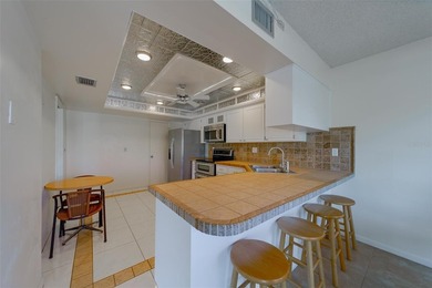 Welcome to this spacious 2-bedroom, 2-bathroom condo offering 1 on East Bay Golf Club in Florida - for sale on GolfHomes.com, golf home, golf lot