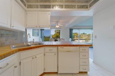 Welcome to this spacious 2-bedroom, 2-bathroom condo offering 1 on East Bay Golf Club in Florida - for sale on GolfHomes.com, golf home, golf lot