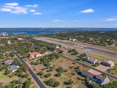 Picture this: your dream home, right on the runway. It's a rare on Slick Rock Golf Course - Horseshoe Bay in Texas - for sale on GolfHomes.com, golf home, golf lot