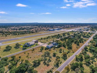 Picture this: your dream home, right on the runway. It's a rare on Slick Rock Golf Course - Horseshoe Bay in Texas - for sale on GolfHomes.com, golf home, golf lot