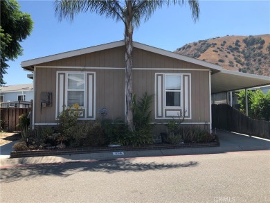Beautiful 3 bedrooms, 2 bathrooms, high ceilings, 3 car carport on Green River Golf Club in California - for sale on GolfHomes.com, golf home, golf lot