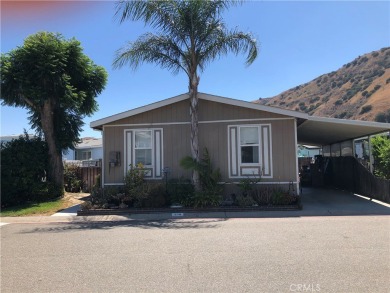 Beautiful 3 bedrooms, 2 bathrooms, high ceilings, 3 car carport on Green River Golf Club in California - for sale on GolfHomes.com, golf home, golf lot