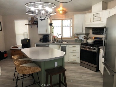 Beautiful 3 bedrooms, 2 bathrooms, high ceilings, 3 car carport on Green River Golf Club in California - for sale on GolfHomes.com, golf home, golf lot