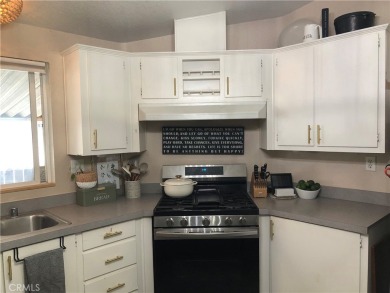 Beautiful 3 bedrooms, 2 bathrooms, high ceilings, 3 car carport on Green River Golf Club in California - for sale on GolfHomes.com, golf home, golf lot