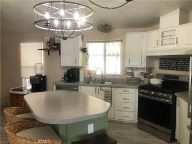 Beautiful 3 bedrooms, 2 bathrooms, high ceilings, 3 car carport on Green River Golf Club in California - for sale on GolfHomes.com, golf home, golf lot