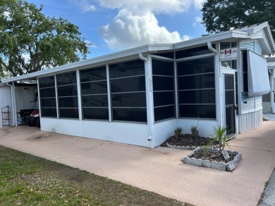 FULLY FURNISHED HOME WITH SO MANY EXTRAS FOR ITS NEW HOMEOWNER! on Silver Dollar Golf and Trap Club in Florida - for sale on GolfHomes.com, golf home, golf lot