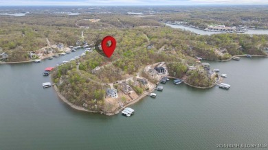 Seize the opportunity to build your dream lakeside retreat on on The Club At Porto Cima in Missouri - for sale on GolfHomes.com, golf home, golf lot