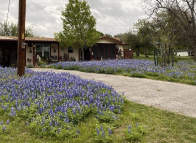 Lake view cottage with views of Packsaddle Mountain and loads of on Packsaddle Country Club in Texas - for sale on GolfHomes.com, golf home, golf lot