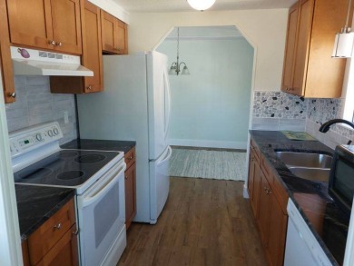 Beautifully updated center cul-de-sac partially furnished home on Lake Fairways Country Club in Florida - for sale on GolfHomes.com, golf home, golf lot