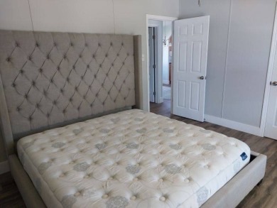 Beautifully updated center cul-de-sac partially furnished home on Lake Fairways Country Club in Florida - for sale on GolfHomes.com, golf home, golf lot