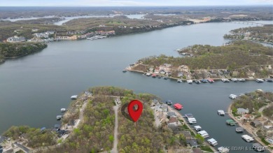 Seize the opportunity to build your dream lakeside retreat on on The Club At Porto Cima in Missouri - for sale on GolfHomes.com, golf home, golf lot