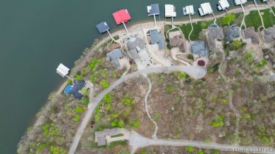Seize the opportunity to build your dream lakeside retreat on on The Club At Porto Cima in Missouri - for sale on GolfHomes.com, golf home, golf lot