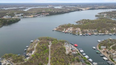 Seize the opportunity to build your dream lakeside retreat on on The Club At Porto Cima in Missouri - for sale on GolfHomes.com, golf home, golf lot
