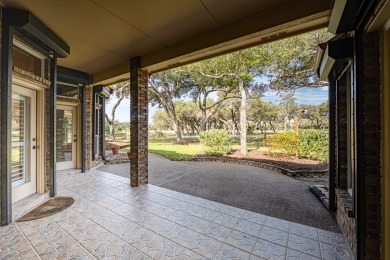 Located in the beautiful Rockport Country Club, this gracious on Rockport Country Club in Texas - for sale on GolfHomes.com, golf home, golf lot