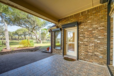 Located in the beautiful Rockport Country Club, this gracious on Rockport Country Club in Texas - for sale on GolfHomes.com, golf home, golf lot