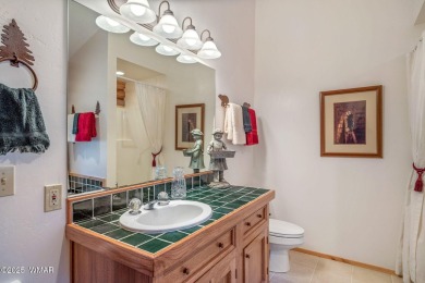 Experience timeless charm and mountain serenity in this fully on White Mountain Country Club in Arizona - for sale on GolfHomes.com, golf home, golf lot