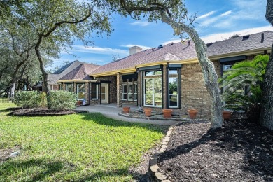 Located in the beautiful Rockport Country Club, this gracious on Rockport Country Club in Texas - for sale on GolfHomes.com, golf home, golf lot