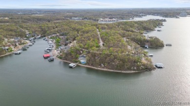 Seize the opportunity to build your dream lakeside retreat on on The Club At Porto Cima in Missouri - for sale on GolfHomes.com, golf home, golf lot