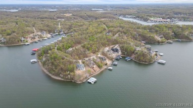 Seize the opportunity to build your dream lakeside retreat on on The Club At Porto Cima in Missouri - for sale on GolfHomes.com, golf home, golf lot