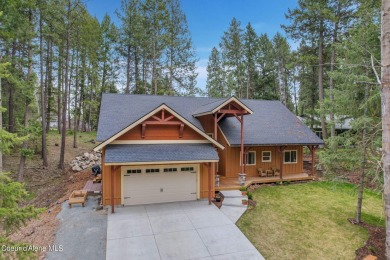 Nestled in the serene settings of Blanchard, Idaho, this custom on Stoneridge Golf Club in Idaho - for sale on GolfHomes.com, golf home, golf lot