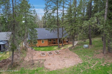 Nestled in the serene settings of Blanchard, Idaho, this custom on Stoneridge Golf Club in Idaho - for sale on GolfHomes.com, golf home, golf lot