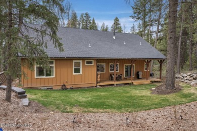 Nestled in the serene settings of Blanchard, Idaho, this custom on Stoneridge Golf Club in Idaho - for sale on GolfHomes.com, golf home, golf lot