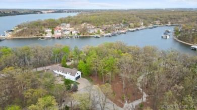 Seize the opportunity to build your dream lakeside retreat on on The Club At Porto Cima in Missouri - for sale on GolfHomes.com, golf home, golf lot