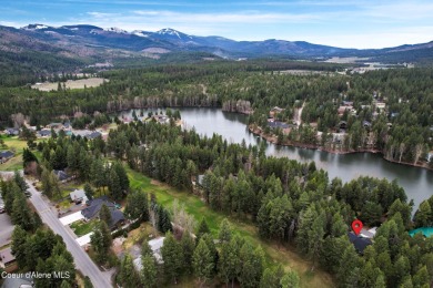 Nestled in the serene settings of Blanchard, Idaho, this custom on Stoneridge Golf Club in Idaho - for sale on GolfHomes.com, golf home, golf lot