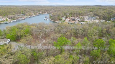 Seize the opportunity to build your dream lakeside retreat on on The Club At Porto Cima in Missouri - for sale on GolfHomes.com, golf home, golf lot