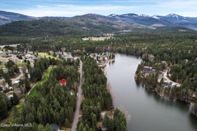 Nestled in the serene settings of Blanchard, Idaho, this custom on Stoneridge Golf Club in Idaho - for sale on GolfHomes.com, golf home, golf lot