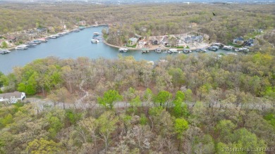Seize the opportunity to build your dream lakeside retreat on on The Club At Porto Cima in Missouri - for sale on GolfHomes.com, golf home, golf lot