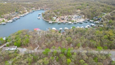 Seize the opportunity to build your dream lakeside retreat on on The Club At Porto Cima in Missouri - for sale on GolfHomes.com, golf home, golf lot