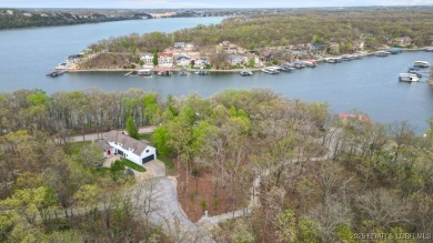 Seize the opportunity to build your dream lakeside retreat on on The Club At Porto Cima in Missouri - for sale on GolfHomes.com, golf home, golf lot