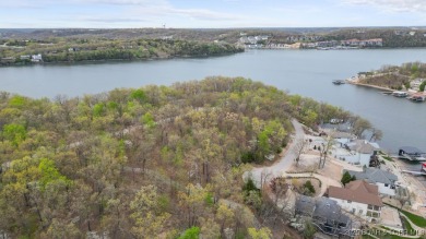 Seize the opportunity to build your dream lakeside retreat on on The Club At Porto Cima in Missouri - for sale on GolfHomes.com, golf home, golf lot