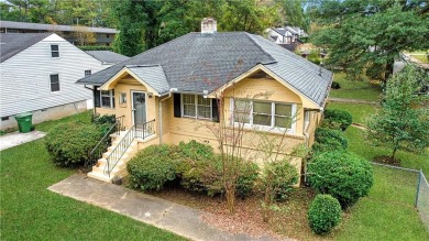 Step into this delightful home brimming with character and ready on Alfred Tup Holmes Golf Course in Georgia - for sale on GolfHomes.com, golf home, golf lot