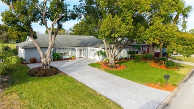 This beautifully maintained 3-bedroom, 2-bathroom pool home on Beacon Woods Golf Club in Florida - for sale on GolfHomes.com, golf home, golf lot