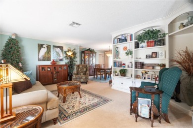 This beautifully maintained 3-bedroom, 2-bathroom pool home on Beacon Woods Golf Club in Florida - for sale on GolfHomes.com, golf home, golf lot