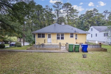 Step into this delightful home brimming with character and ready on Alfred Tup Holmes Golf Course in Georgia - for sale on GolfHomes.com, golf home, golf lot