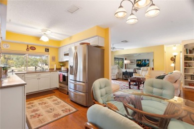 This beautifully maintained 3-bedroom, 2-bathroom pool home on Beacon Woods Golf Club in Florida - for sale on GolfHomes.com, golf home, golf lot