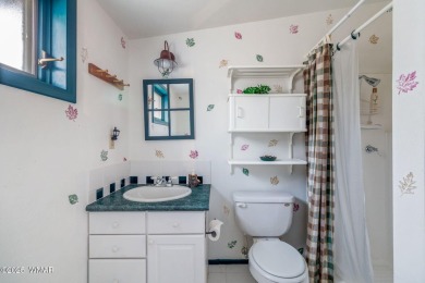 Experience timeless charm and mountain serenity in this fully on White Mountain Country Club in Arizona - for sale on GolfHomes.com, golf home, golf lot