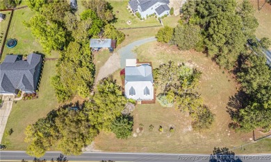 Welcome to 1768 Airport Road! A charming home with modern on Whispering Woods in North Carolina - for sale on GolfHomes.com, golf home, golf lot
