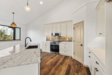 Enjoy sweeping mountain and golf course views from this on Red Lodge Golf Club in Montana - for sale on GolfHomes.com, golf home, golf lot