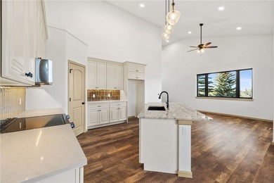 Enjoy sweeping mountain and golf course views from this on Red Lodge Golf Club in Montana - for sale on GolfHomes.com, golf home, golf lot