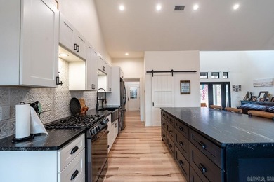 This beautifully designed, newly built 2022 home on Greers Ferry on Thunderbird Country Club in Arkansas - for sale on GolfHomes.com, golf home, golf lot