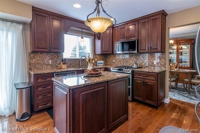 Meticulously maintained & tastefully updated 4 Bedroom / 2.5 on Beacon Hill Golf Club in Michigan - for sale on GolfHomes.com, golf home, golf lot